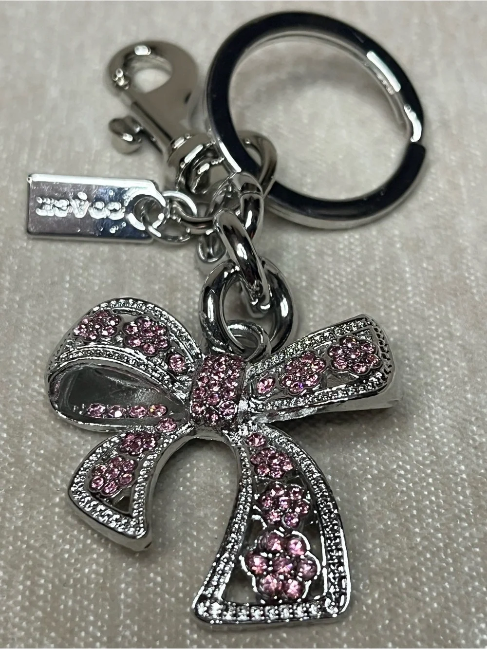 Coach Crystal Bow Keychain with Pink Rhinestones